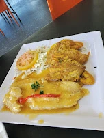 Mero Al Ajillo Con Tostones